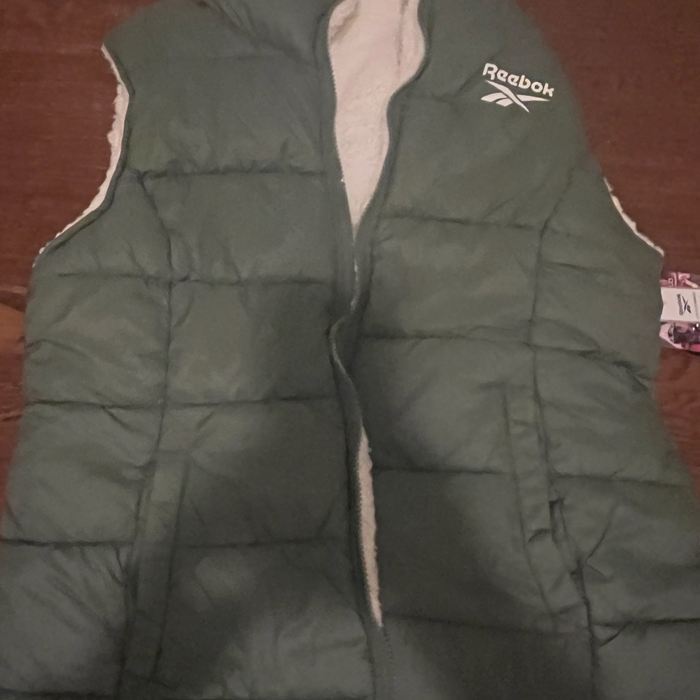 Reebok very warm vest size large and reversible